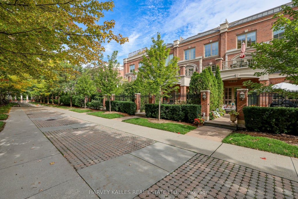 Photo of 21 Burkebrook Place #TH9, Toronto, ON M4G 0A2 (MLS # C13849062)
