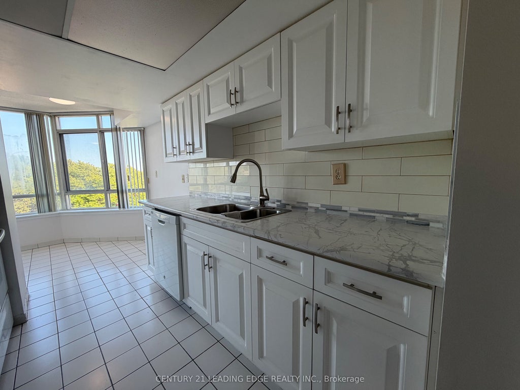Photo of 11753 Sheppard Avenue E #422, Toronto, ON M1B 5M3 (MLS # E13775862)