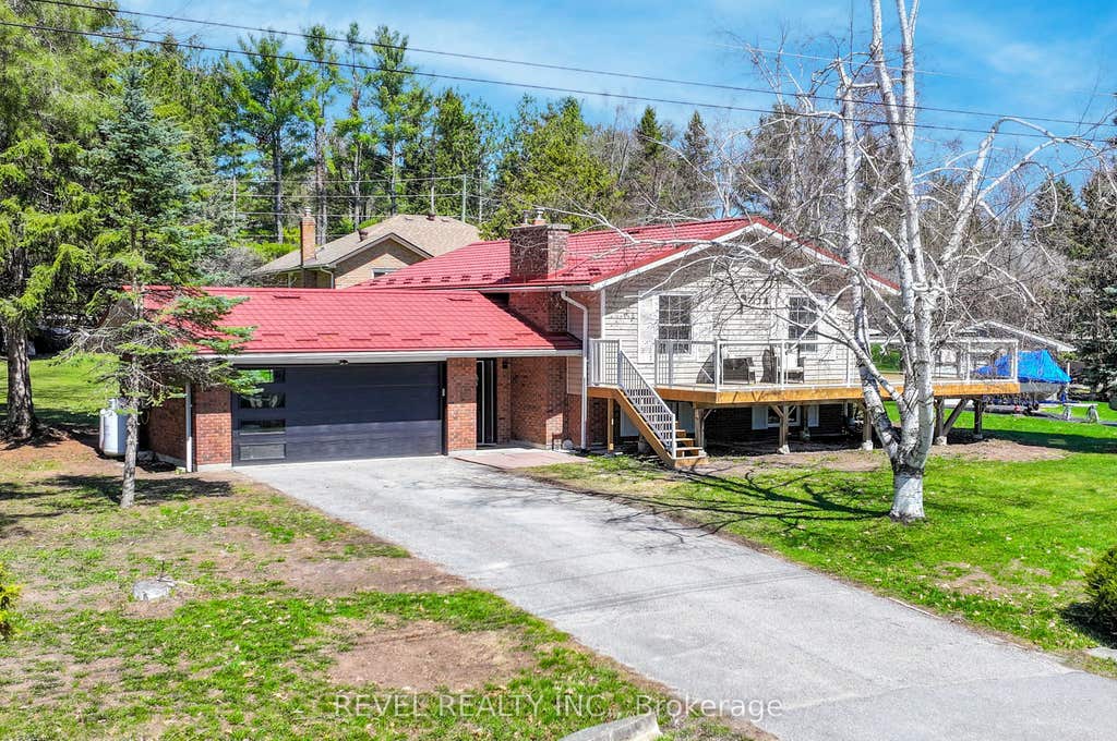 Photo of 13 Pirates Glen Drive, Trent Lakes, ON K0M 1A0 (MLS # X13088162)