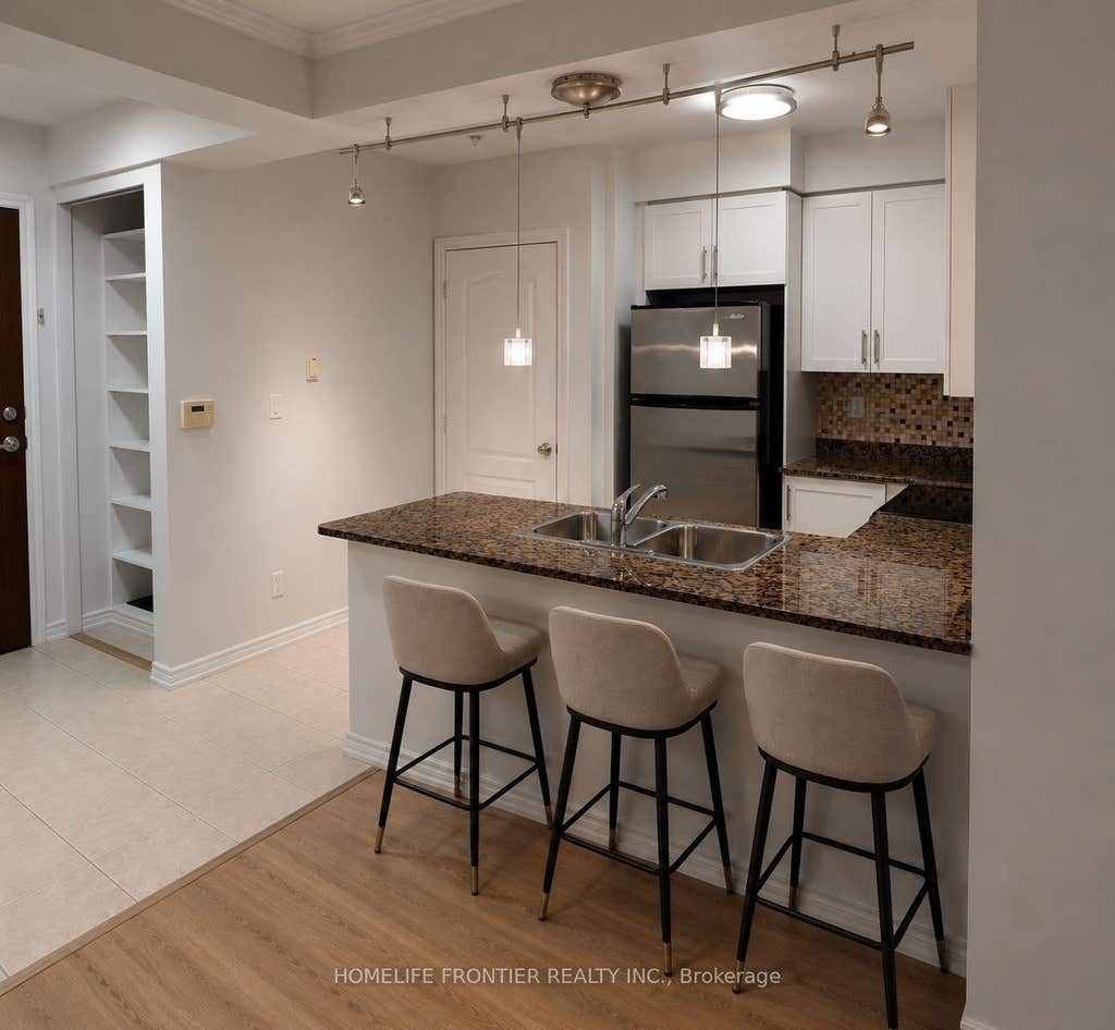 Photo of 100 Promenade Circle #1111, Vaughan, ON L4J 7W7 (MLS # N13610114)
