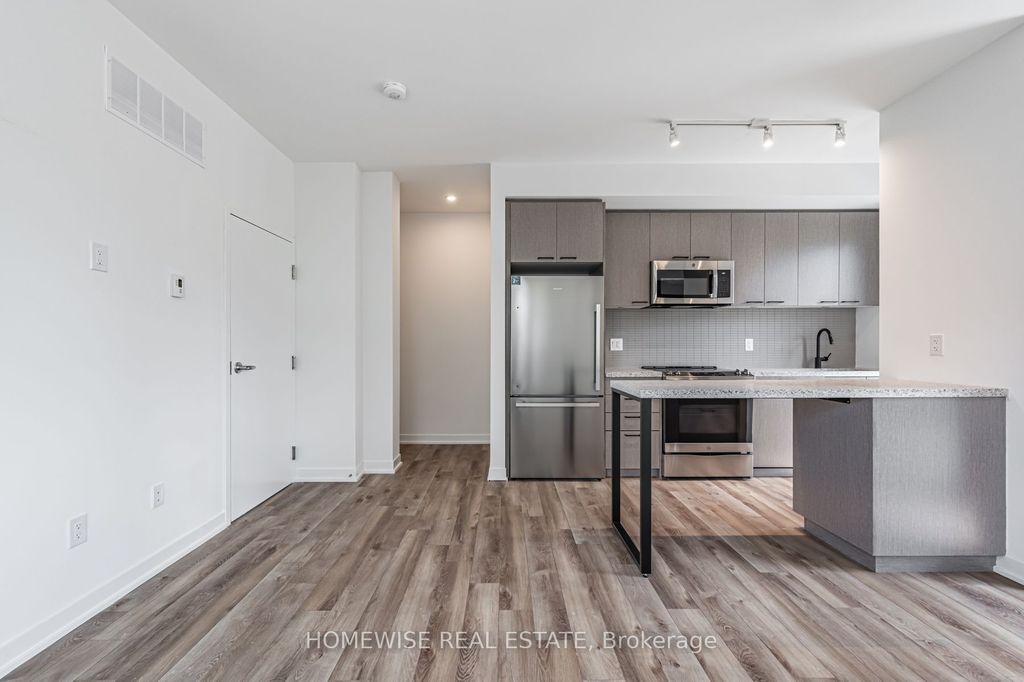 Photo of 20 Ed Clark Gardens #TH8, Toronto, ON M6N 0B5 (MLS # W12662058)