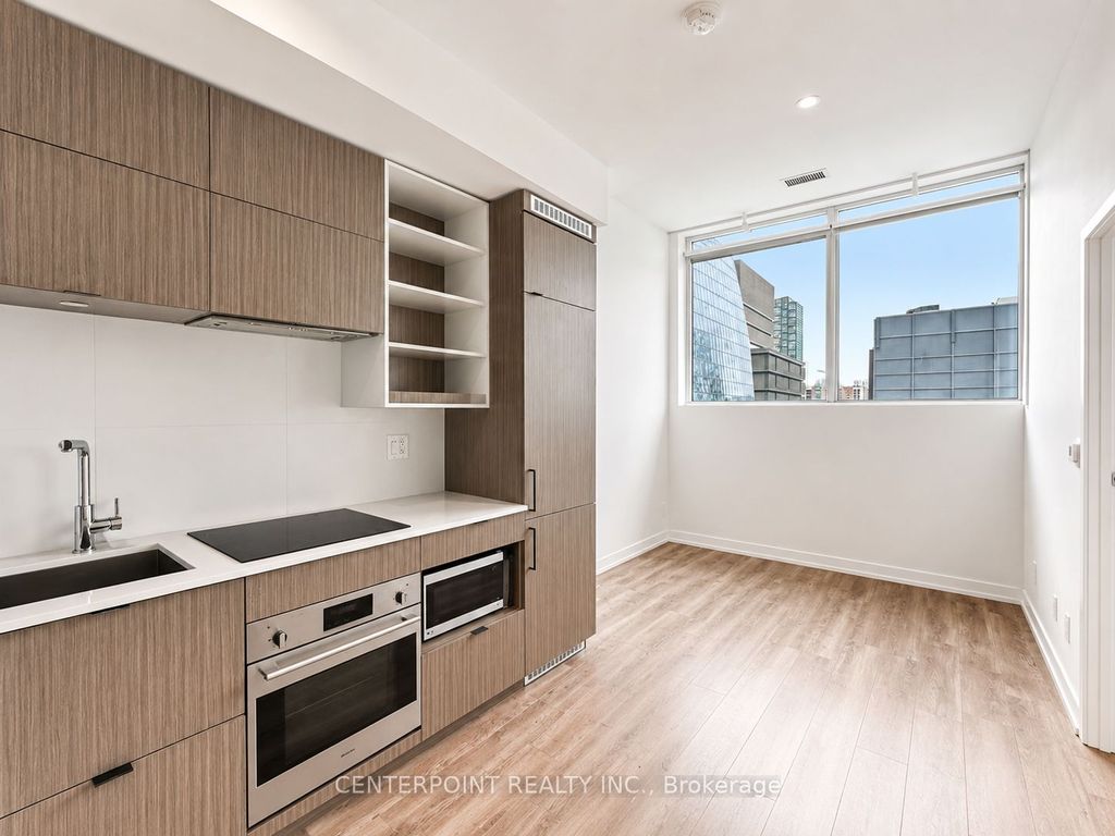 Photo of 20 Edward Street #404, Toronto, ON M5G 0C5 (MLS # C13096344)