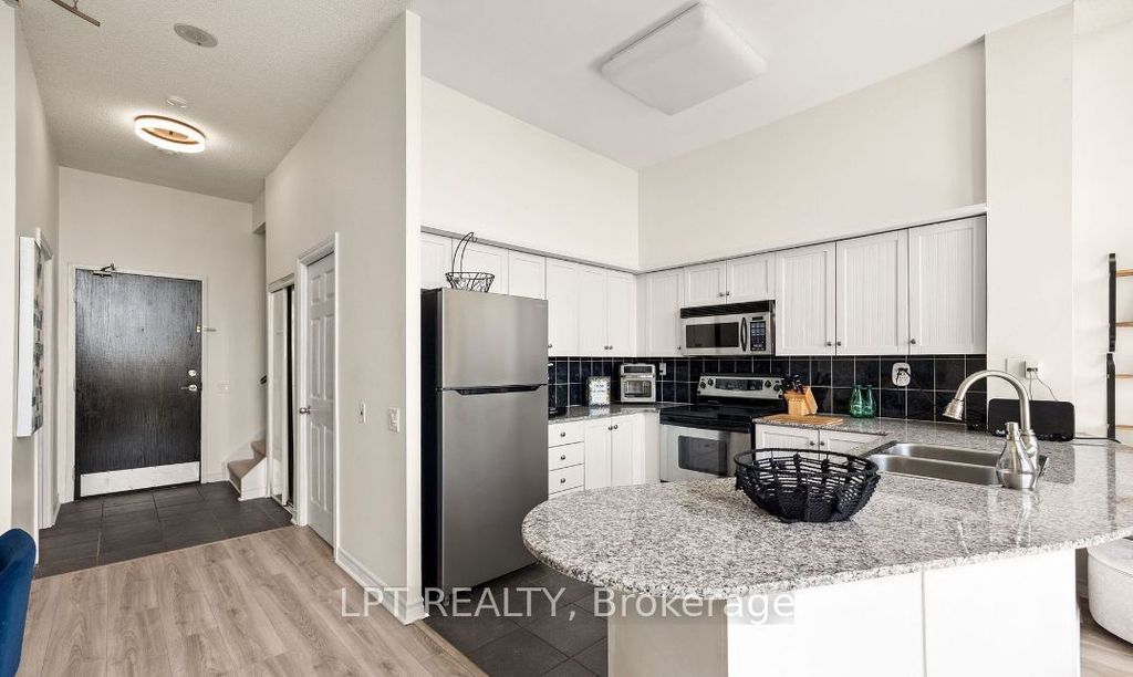 Photo of 1720 Eglinton Avenue E #108, Toronto, ON M4A 1J7 (MLS # C12853752)