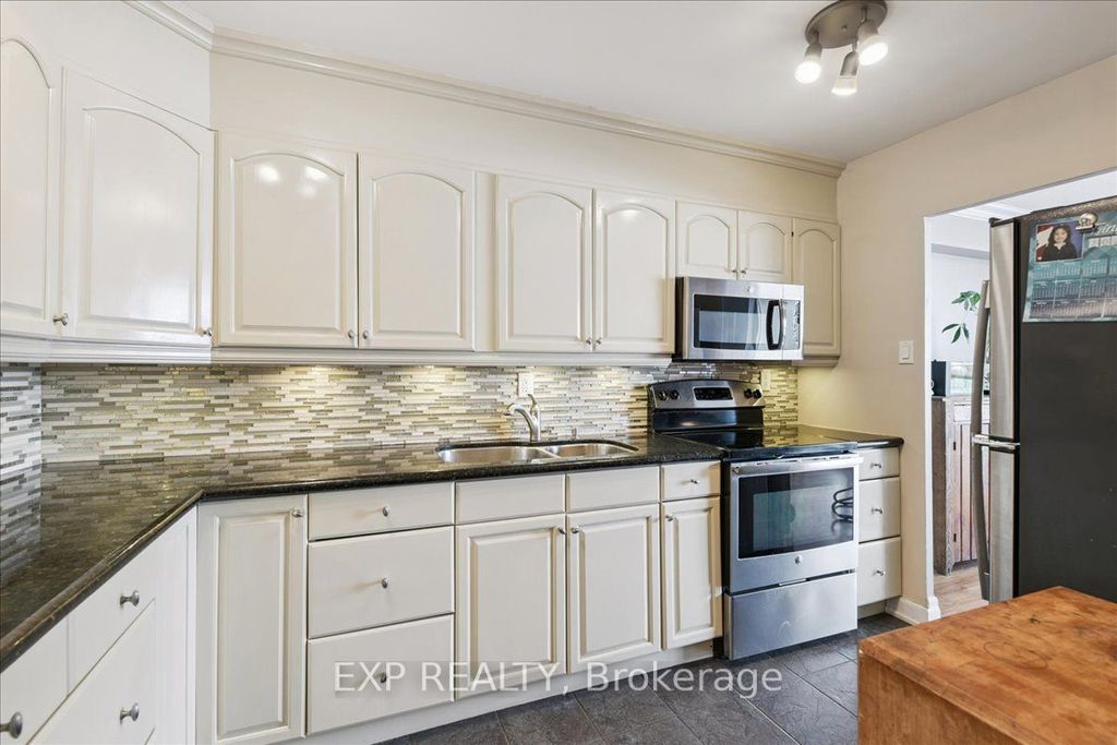 Photo of 44 Longbourne Drive #412, Toronto, ON M9R 2M7 (MLS # W12840086)