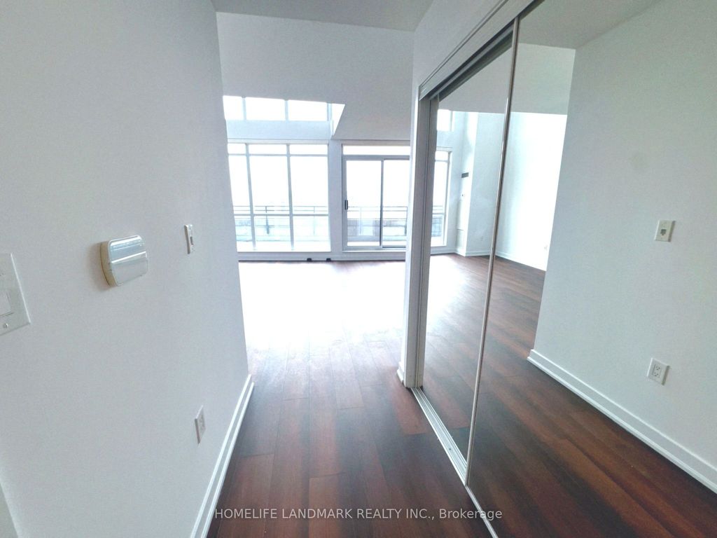 Photo of 8 Telegram Mews #833, Toronto, ON M5V 3Z5 (MLS # C12345882)