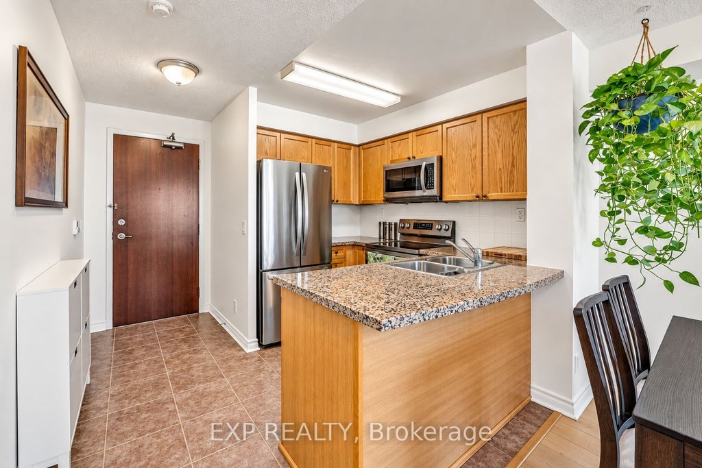 Photo of 5 Michael Power Place #709, Toronto, ON M9A 0A3 (MLS # W14033800)