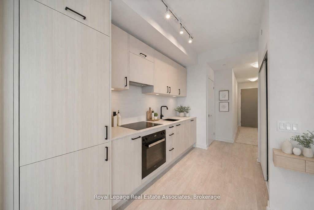 Photo of 1 Quarrington Lane #1004, Toronto, ON M3C 0S4 (MLS # C13230410)