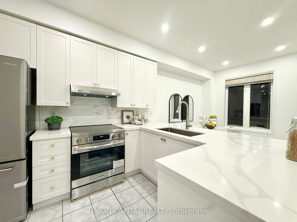 Photo of 29 Queen's Plate Drive, Markham, ON L6C 2A9 (MLS # N12741204)
