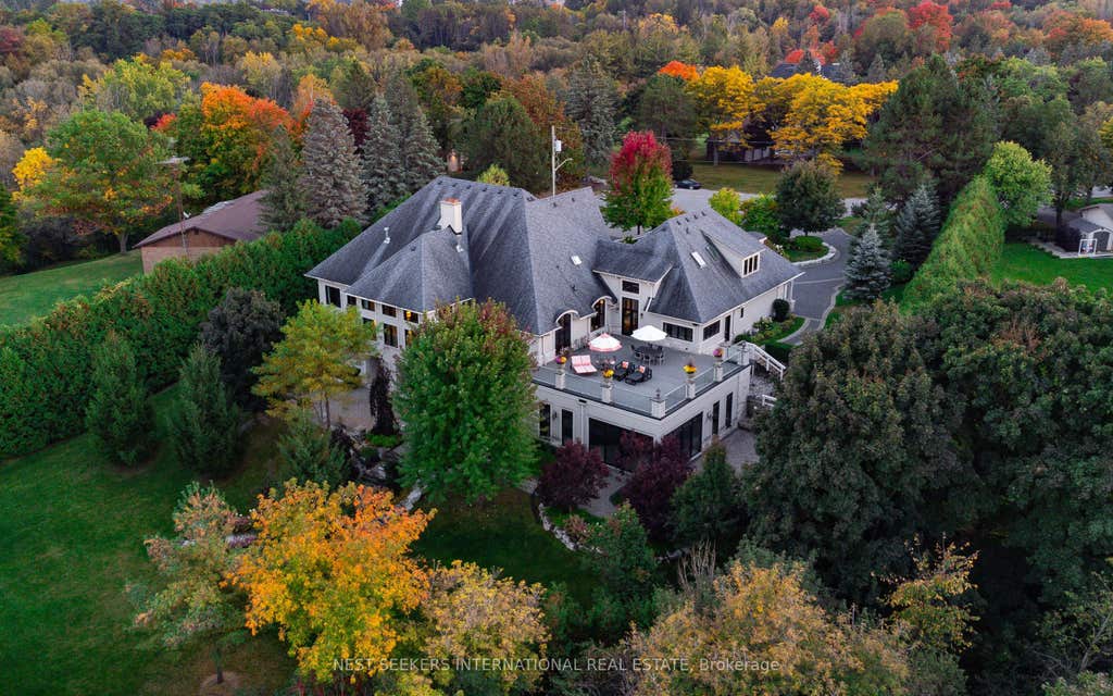 Photo of 111 Manitou Drive, King, ON L7B 1E7 (MLS # N13712102)