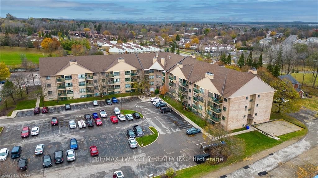 Photo of 15 Hofstetter Avenue #318, Kitchener, ON N2A 3Z7 (MLS # X13042242)