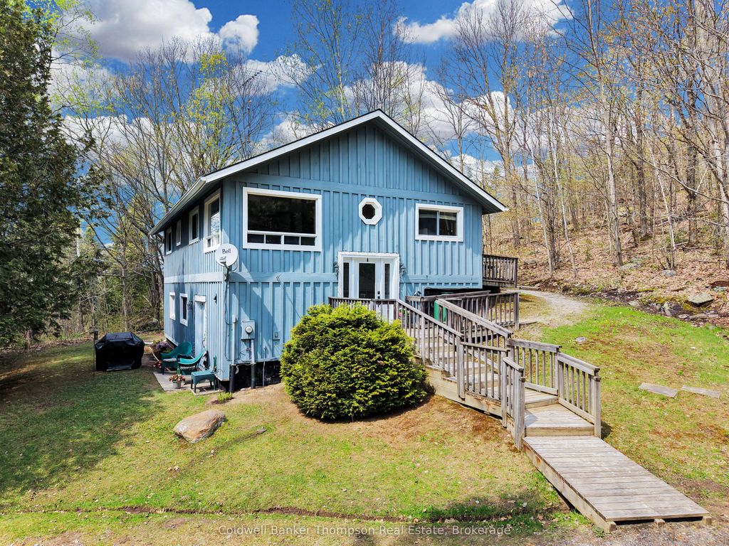 Photo of 779 Old Muskoka Road, Huntsville, ON P0B 1M0 (MLS # X13156786)