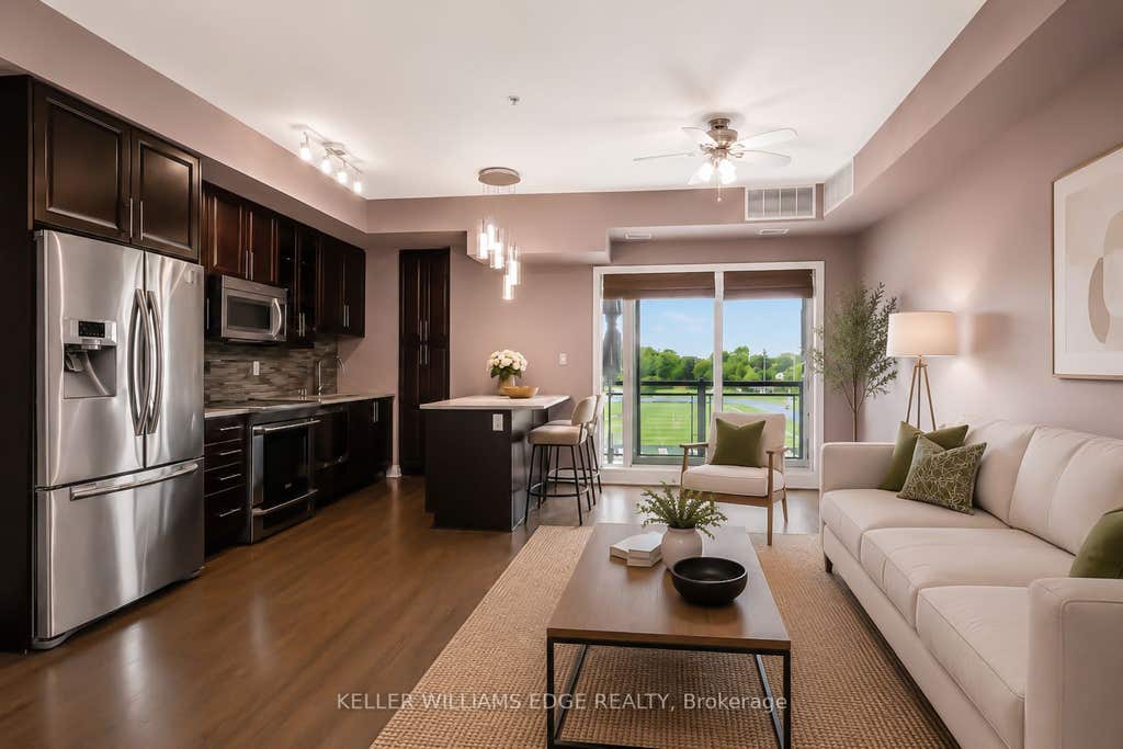 Photo of 128 Garden Drive #413, Oakville, ON L6K 0H7 (MLS # W13470296)