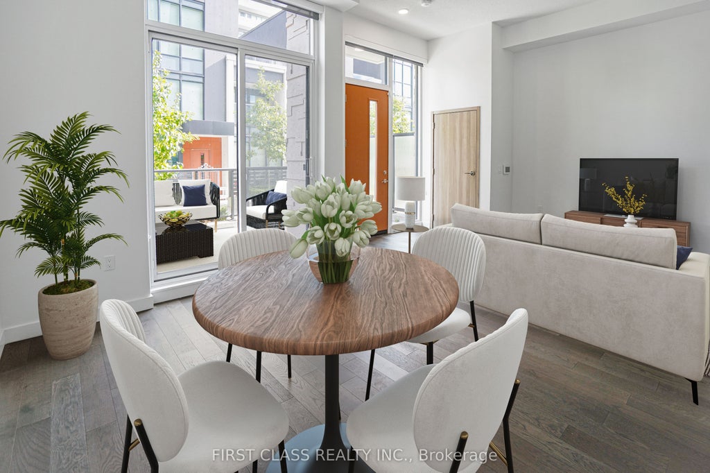 Photo of 95 Mcmahon Drive #TH103, Toronto, ON M2K 0H2 (MLS # C13942654)