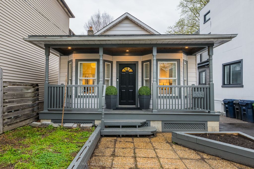 Photo of 203 Rhodes Avenue, Toronto, ON M4L 3A2 (MLS # E13171404)