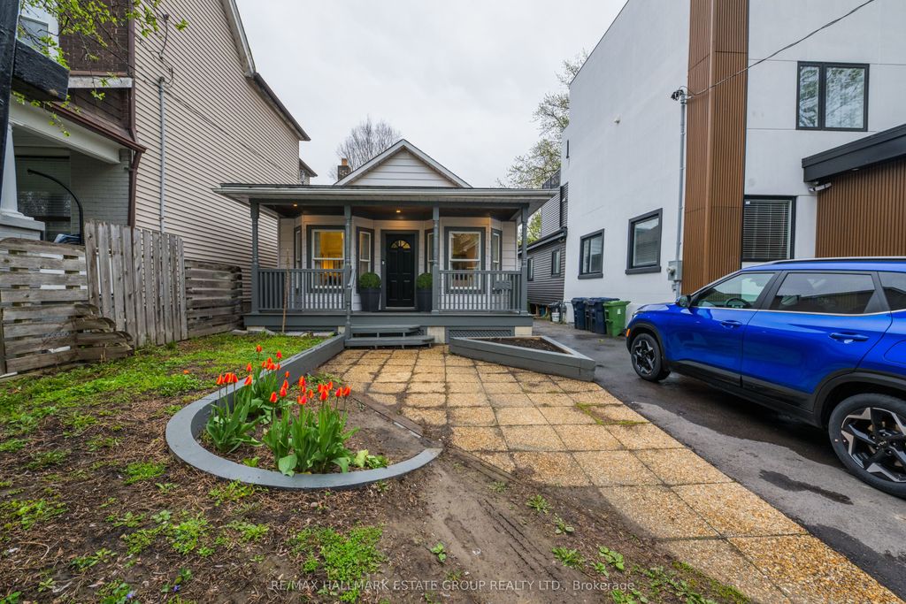 Photo of 203 Rhodes Avenue, Toronto, ON M4L 3A2 (MLS # E13171404)