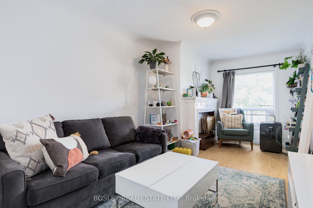 Photo of 203 Virginia Avenue, Toronto, ON M4C 2T6 (MLS # E12412421)