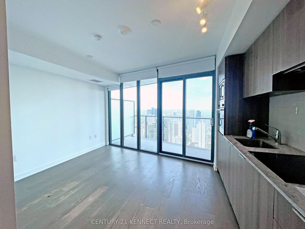 Photo of 11 Wellesley Street W #4312, Toronto, ON M4Y 0G4 (MLS # C12529168)