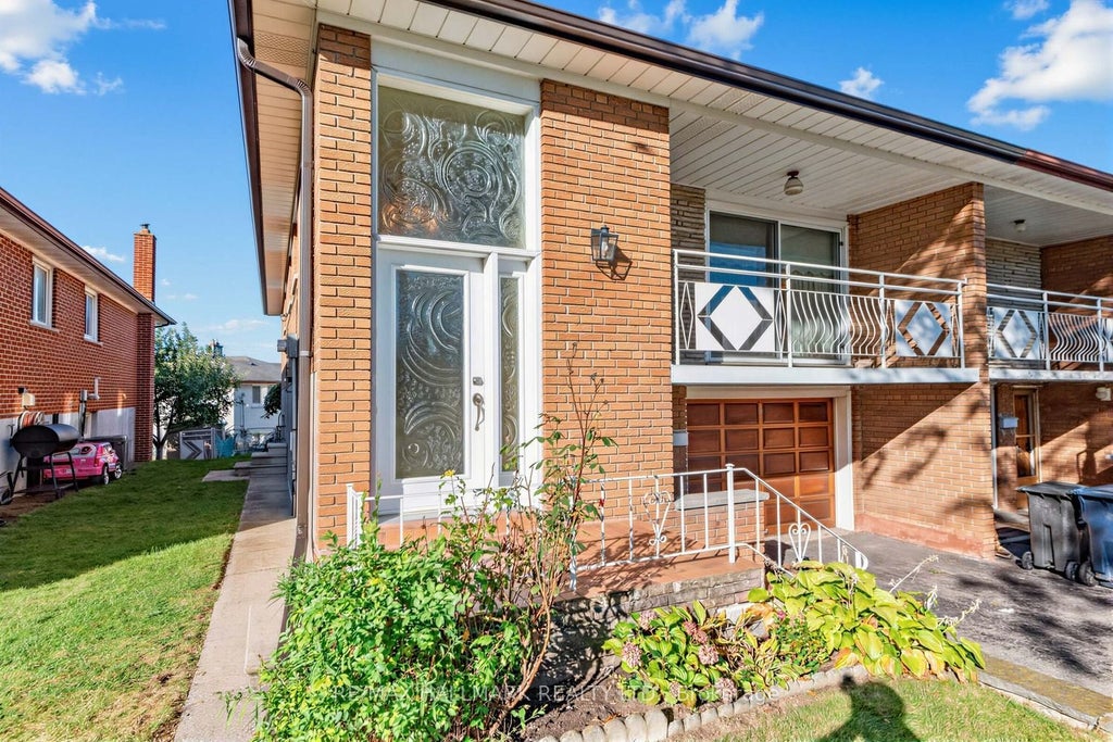 Photo of 18 Sorlyn Avenue, Toronto, ON M6L 1H8 (MLS # W13868590)