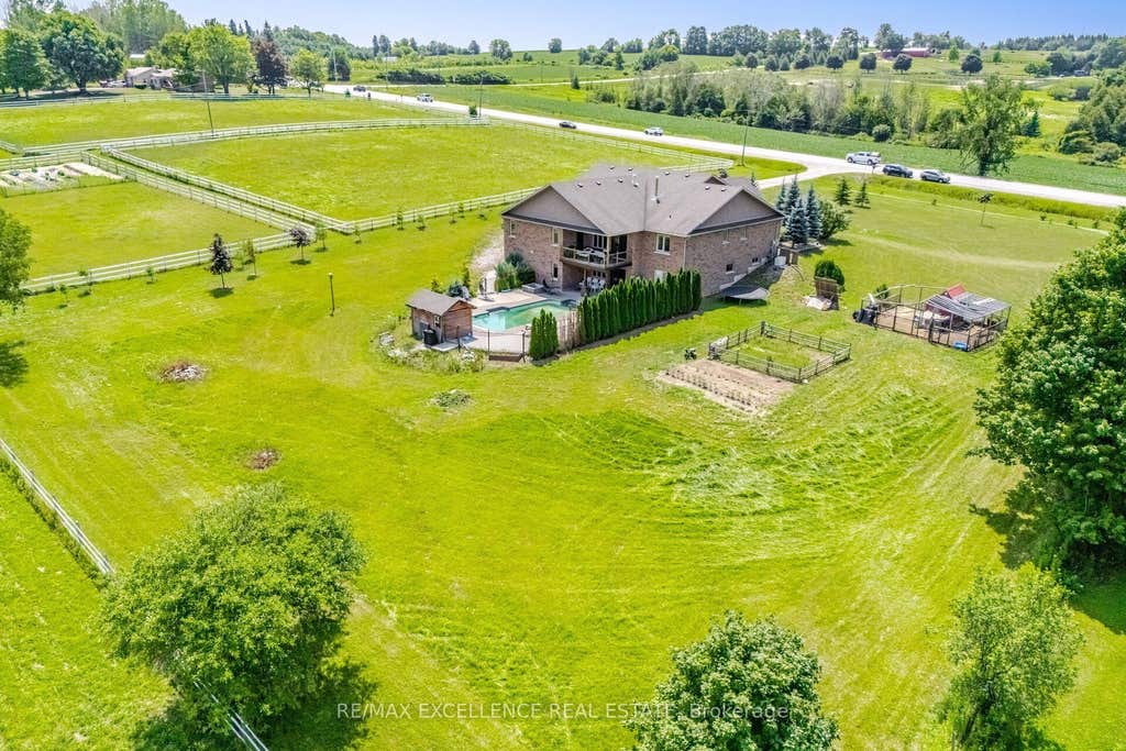 Photo of 5593 Trafalgar Road, Erin, ON N0B 1Z0 (MLS # X13653014)