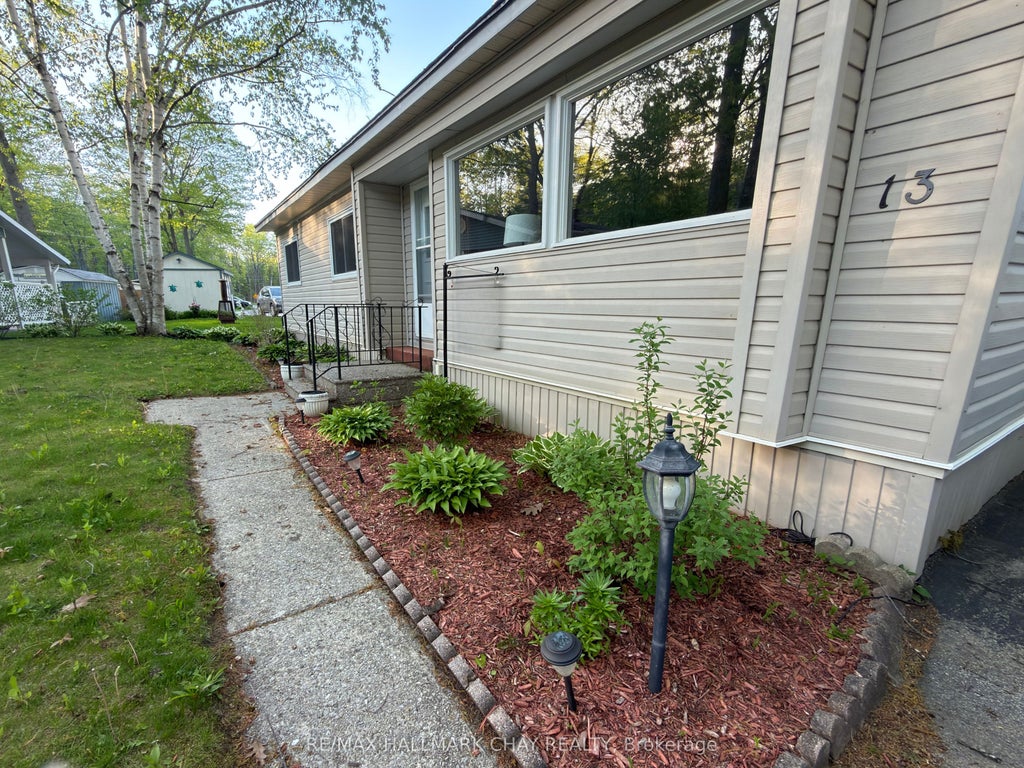 Photo of 13 Carruthers Street N, Wasaga Beach, ON L9Z 1K2 (MLS # S13861578)