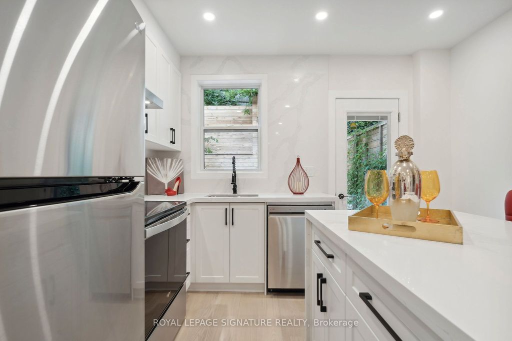 Photo of 36 Tennis Crescent, Toronto, ON M4K 1J3 (MLS # E13025624)