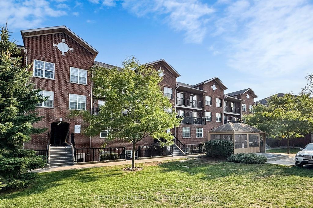 Photo of 45 Strangford Lane #308F, Toronto, ON M1L 0E5 (MLS # E13077380)