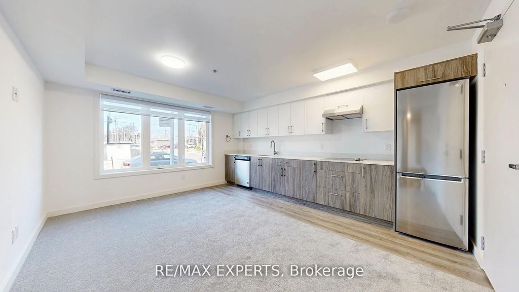 Photo of 45 Connaught Avenue #101, Toronto, ON M4L 2V8 (MLS # E12421426)