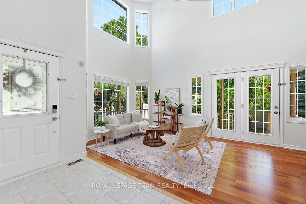 Photo of 13 RIVERSTONE Drive, Barrhaven, ON K2J 4X7 (MLS # X13611314)