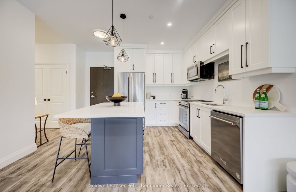 Photo of 332 Gosling Gardens #104, Guelph, ON N1L 0P8 (MLS # X13557558)