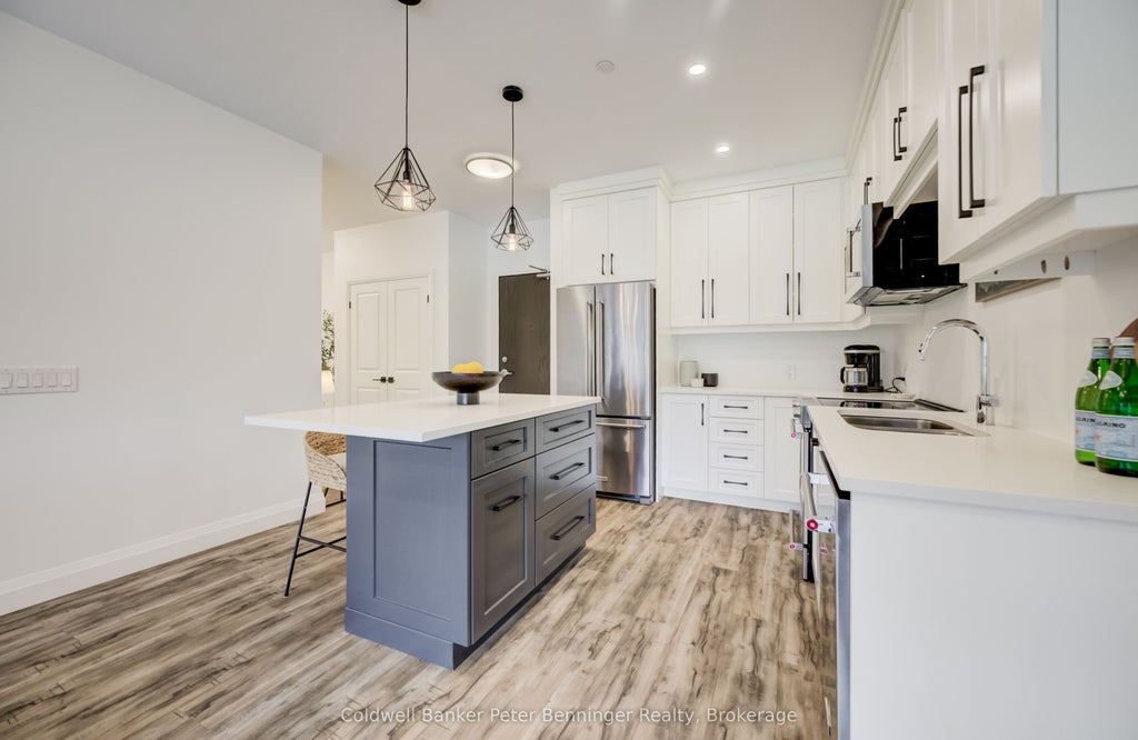 Photo of 332 Gosling Gardens #104, Guelph, ON N1L 0P8 (MLS # X13557558)