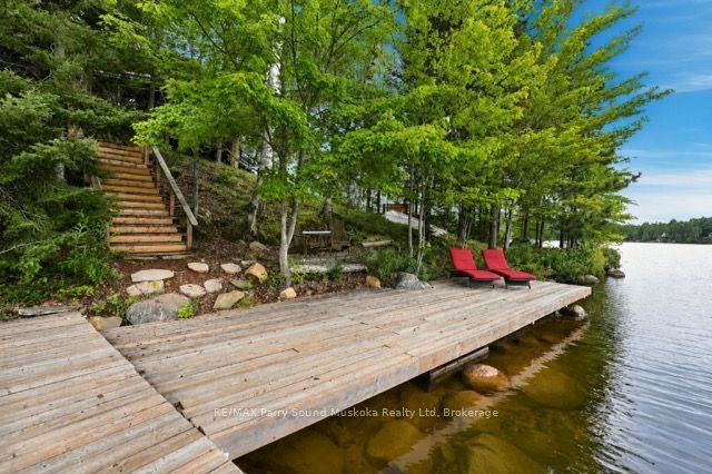 Photo of 569 Ralph Road, Parry Sound Remote Area, ON P0H 2L0 (MLS # X13689986)
