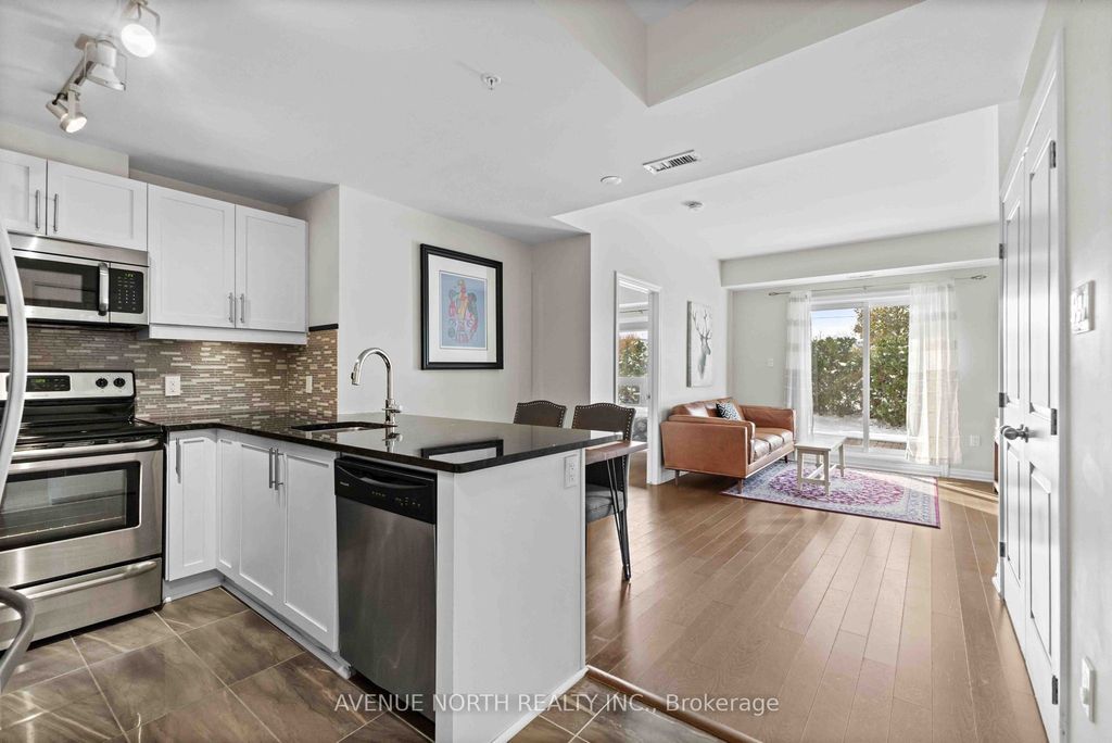 Photo of 200 Winterfell Private #104, Hunt Club - South Keys and Area, ON K1G 4J1 (MLS # X12551834)