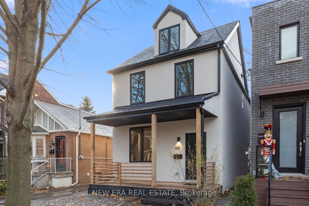 Photo of 148 Rhodes Avenue, Toronto, ON M4L 3A1 (MLS # E12863534)