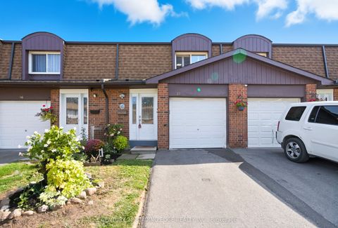 Photo of 1980 Rosefield Road #15, Pickering, ON L1V 3M4 (MLS # E12474236)