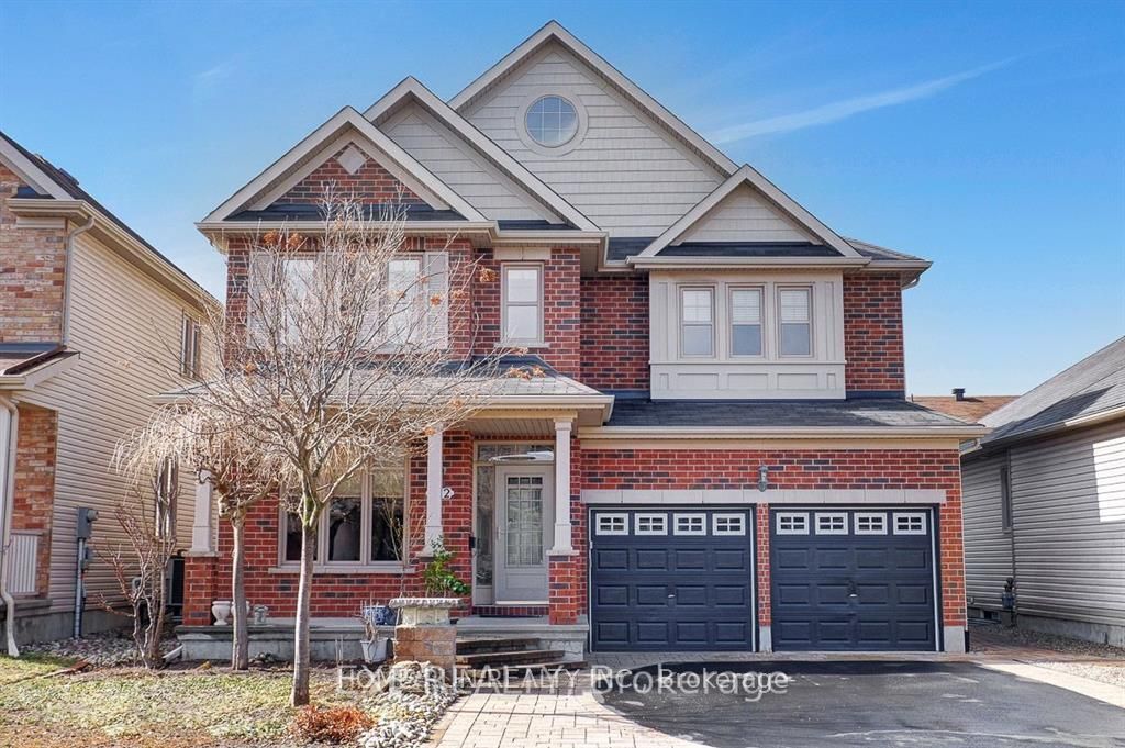 Photo of 122 Rodeo Drive, Barrhaven, ON K2J 5K3 (MLS # X13005010)