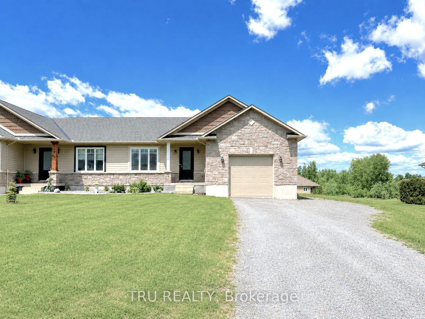 Beautiful curb appeal with extra long driveway