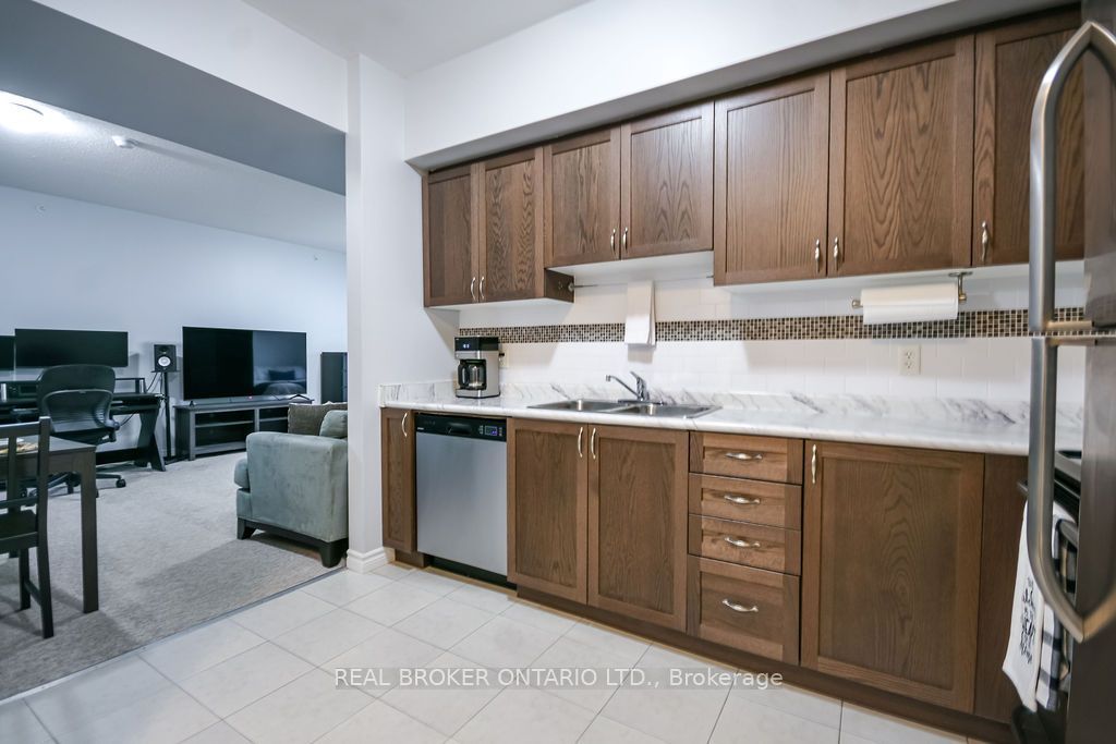 Photo of 40 Ferndale Drive S #404, Barrie, ON L4N 2L3 (MLS # S12614354)