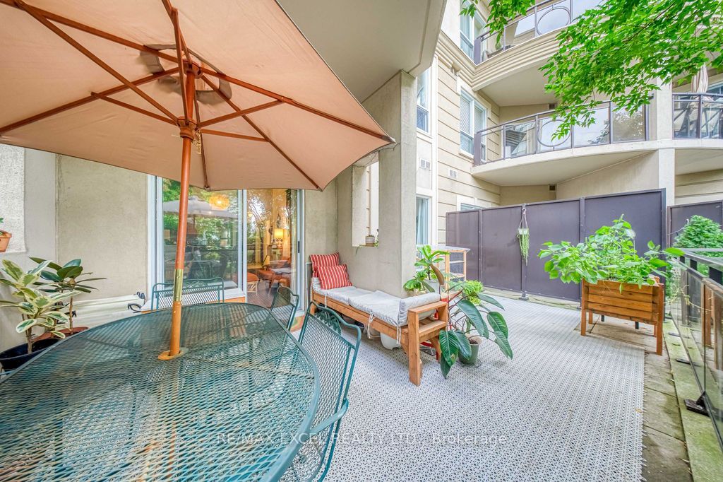 Photo of 8 Maison Parc Court #102, Vaughan, ON L4J 9K5 (MLS # N13815016)