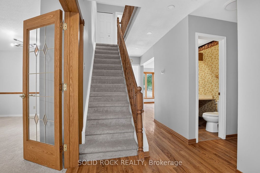 Photo of 54 Huntsman Crescent, Kanata, ON K2M 1C4 (MLS # X13564070)