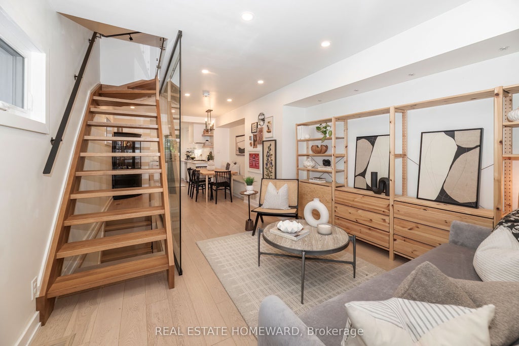 Photo of 115 Wildwood Crescent, Toronto, ON M4L 2K9 (MLS # E14097510)