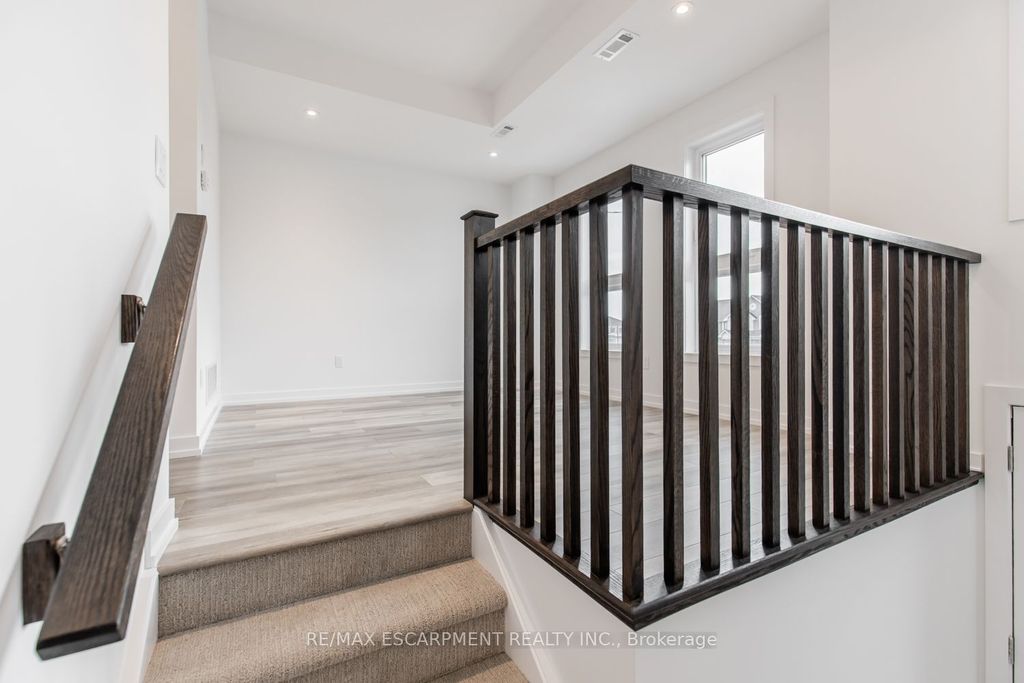 Photo of 70 Kenesky Drive #4, Hamilton, ON L8B 2A9 (MLS # X12806660)