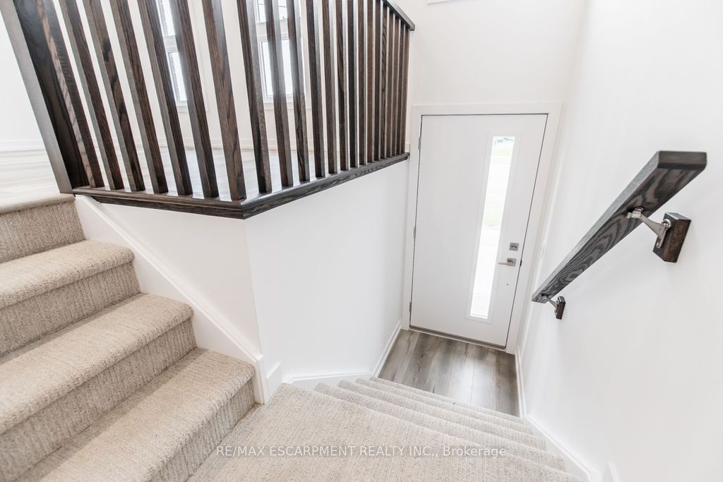 Photo of 70 Kenesky Drive #4, Hamilton, ON L8B 2A9 (MLS # X12806660)