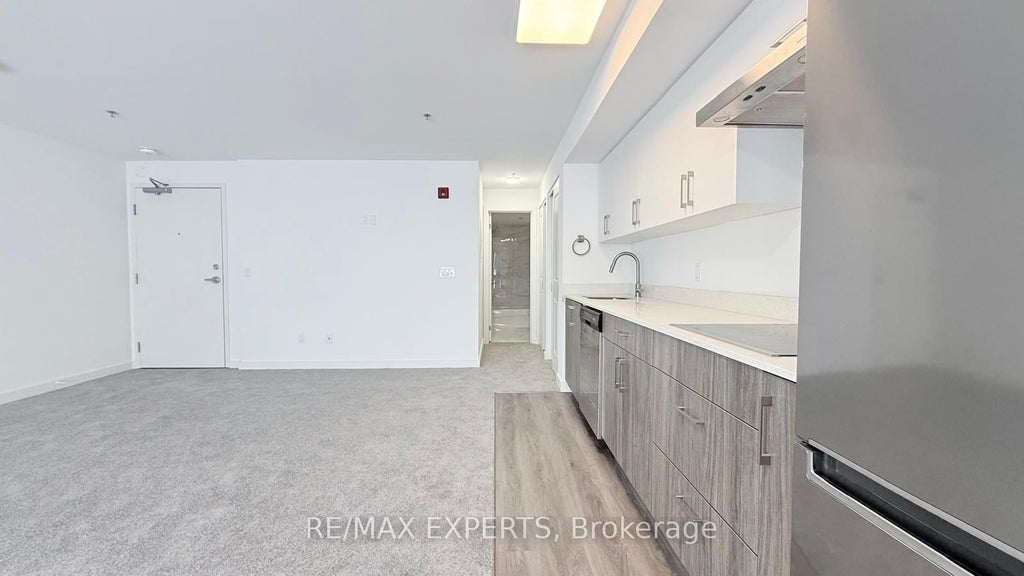 Photo of 45 Connaught Avenue #404, Toronto, ON M4L 2V8 (MLS # E13689002)