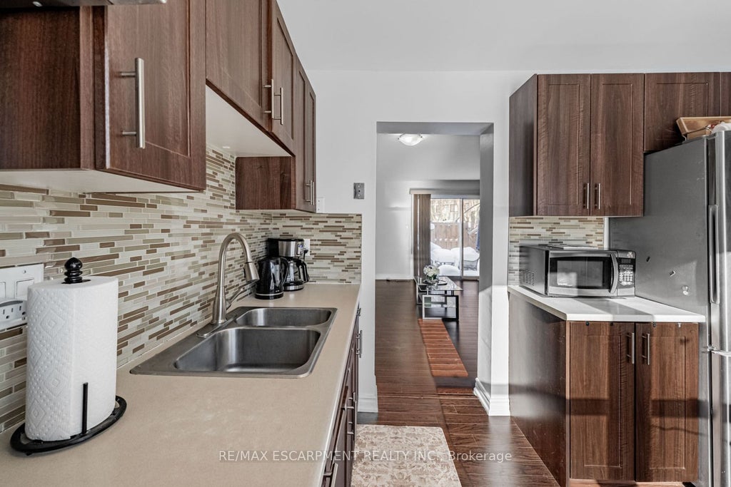 Photo of 6650 Falconer Drive #19, Mississauga, ON L5N 1B5 (MLS # W14083564)