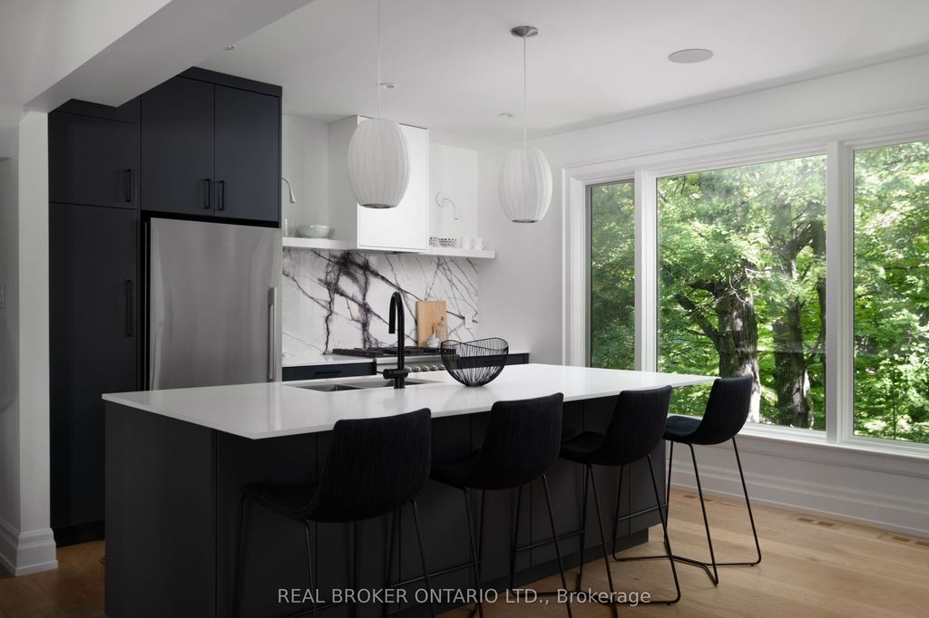 Photo of 5 Wembley Drive, Toronto, ON M4L 3C9 (MLS # E12440054)