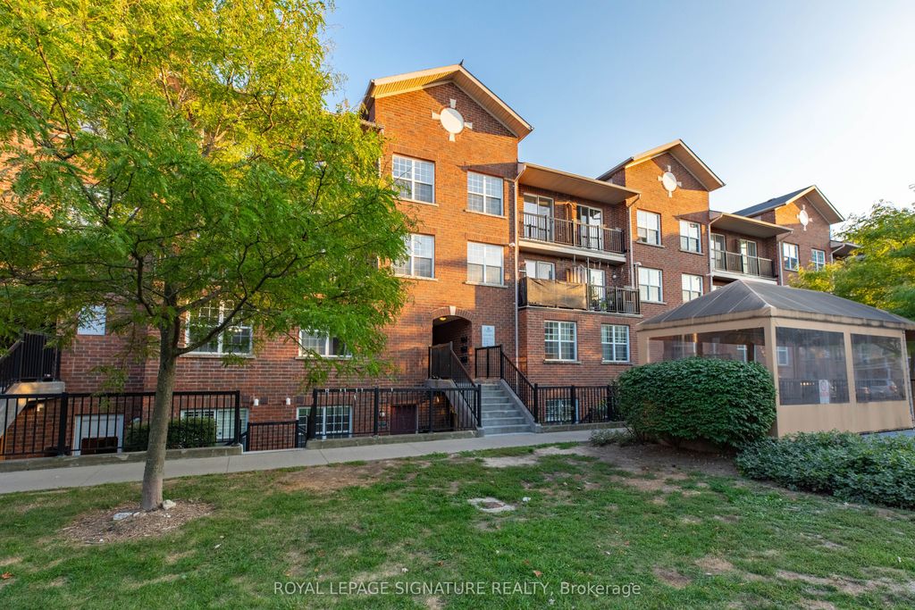 Photo of 45 Strangford Lane #309, Toronto, ON M1L 0E5 (MLS # E13076942)