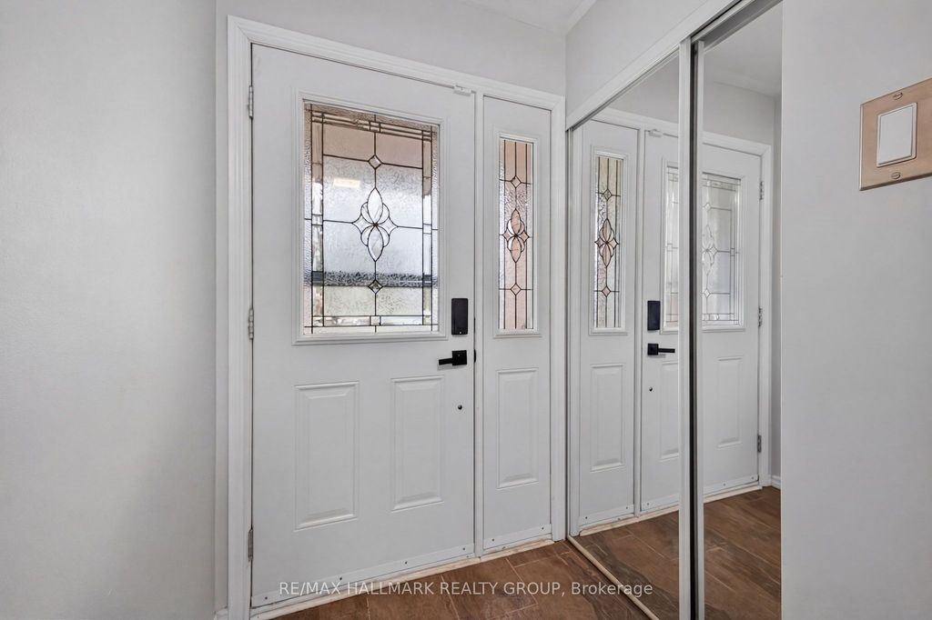 Photo of 80 PICKWICK Drive, Barrhaven, ON K2J 3E2 (MLS # X13032704)