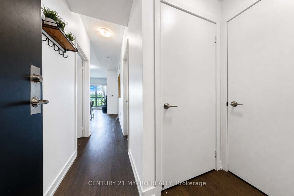 Photo of 555 William Graham Drive #320, Aurora, ON L4G 3H9 (MLS # N13870574)