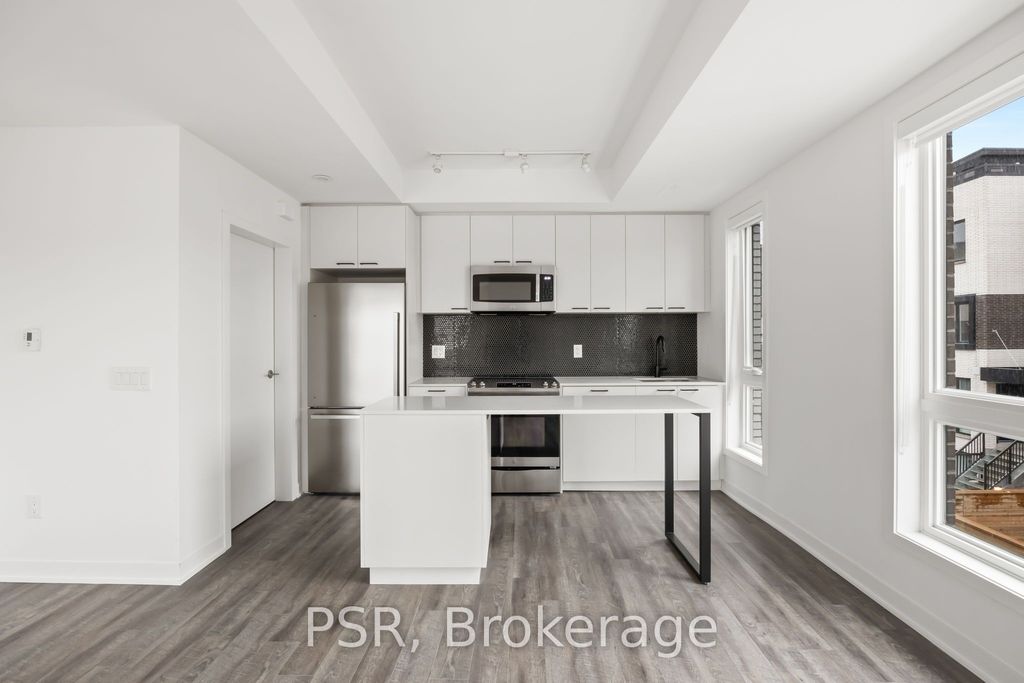 Photo of 40 Ed Clark Gardens Boulevard #TH13, Toronto, ON M6N 0B5 (MLS # W12827546)