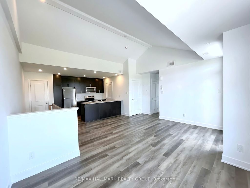 Photo of 300 Tulum Crescent #i, Kanata, ON K2S 2Y4 (MLS # X13022586)